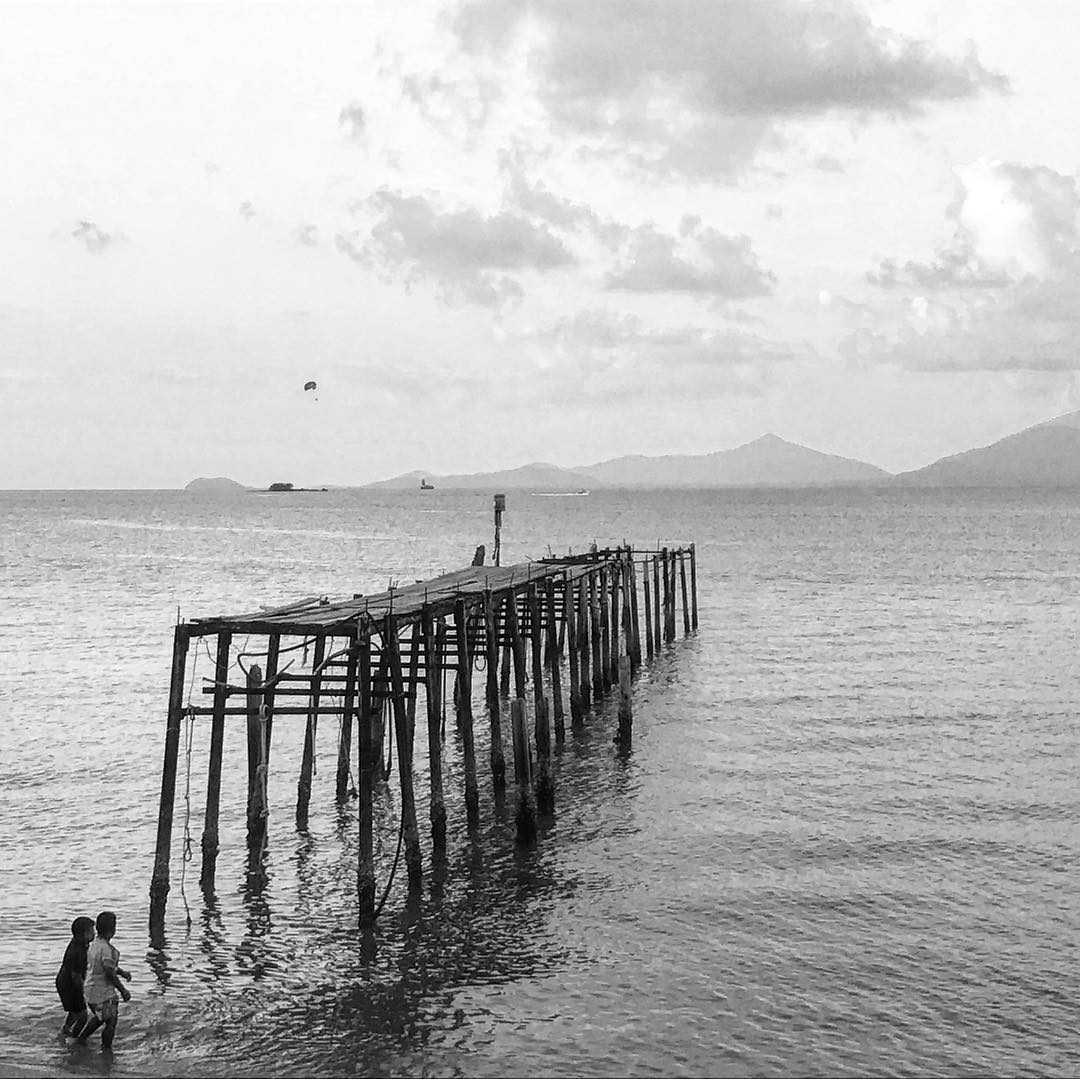 Pier-ing, a black-and-white fine art metal print